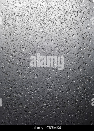 Wet shiny gray metal with drops of water background texture Stock Photo