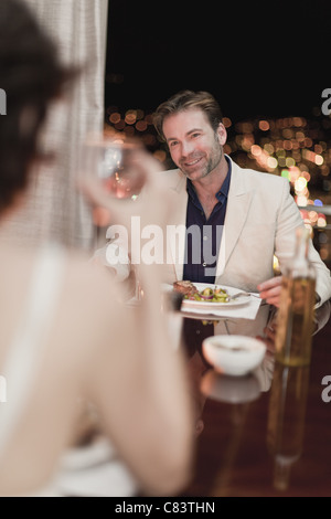 Couple having romantic dinner at home Stock Photo