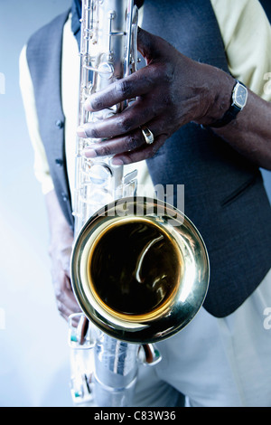 African American musician playing saxophone Stock Photo