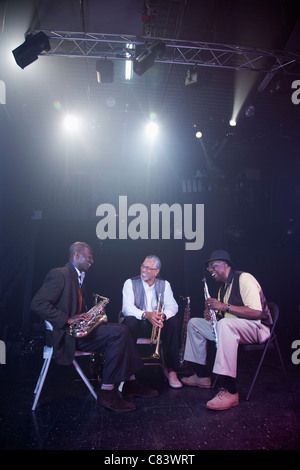 Musicians playing in jazz band on stage Stock Photo