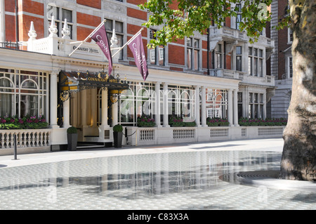 Connaught Hotel Luxury five star exterior & entrance in Carlos Place Mayfair with 'Silence’ water feature & tree by Tadao Ando London West End UK Stock Photo