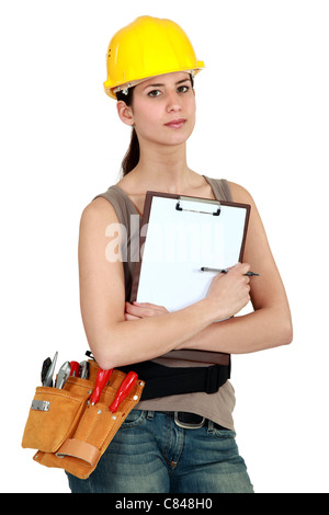 Female worker holding clipboard Stock Photo