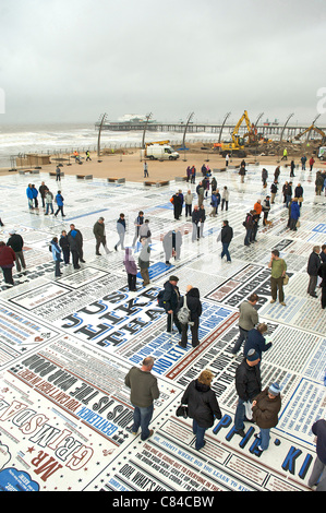 BLACKPOOL, UK, MON 10TH OCT, 2011. The Blackpool Comedy Carpet opens on the beachside resort's promenade. The piece, created by artist Gordon Young, features 1000s of catchphrases from comedians who have performed in Blackpool over the years. Stock Photo