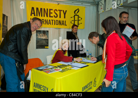 Pa-ris,  France, 'Amnesty International' Volunteers outside in a protest against the death penalty Exhibit, human rights activists Discussion, non profit