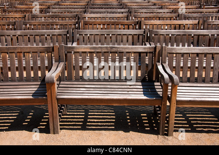 Old grungy wooden benches in the park Stock Photo