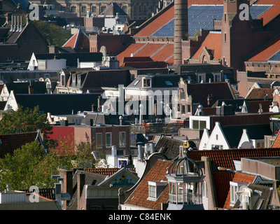 Amsterdam city centre rooftops, the Netherlands. The large building top right is the Beurs by Berlage. Stock Photo