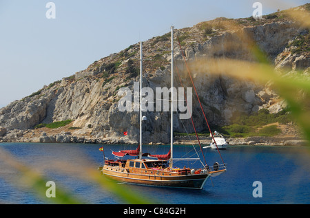 KNIDOS, DATCA PENINSULA, TURKEY. A traditional Turkish gulet moored in the harbour at ancient Knidos. 2011.