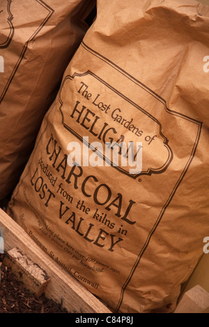 Paper sack containing charcoal made at Lost gardens of Heligan, Cornwall Stock Photo