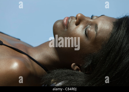 Woman sunbathing Stock Photo