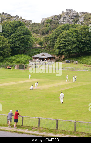 A game of cricket taking place on the delightful pitch in the Valley of the Rocks, Lynton, Devon UK Stock Photo