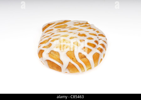 Cheese Danish Pastry with icing on white background, cutout. Stock Photo