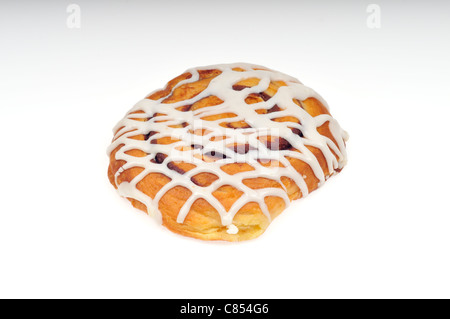 Cinnamon Danish Pastry with icing on white background cutout Stock Photo