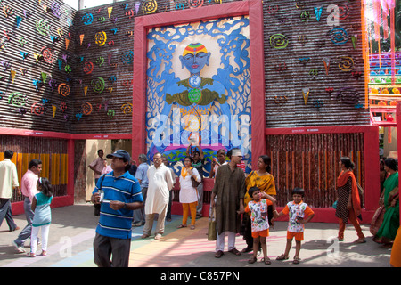 Devotees at Vivekanand Park Athletic Club Durga Puja pandal in Haridevpur, Kolkata (Calcutta), West Bengal, India. Stock Photo