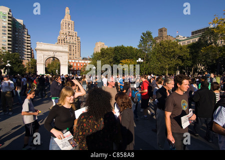 Thousands of people seen in New York's Washington Square Park during the Occupy Wall Street march from Zuccotti Park. Stock Photo