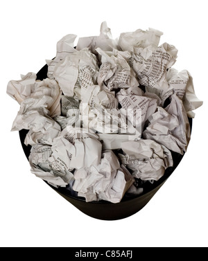 Wastepaper basket full of crumpled paper isolated on white background Stock Photo