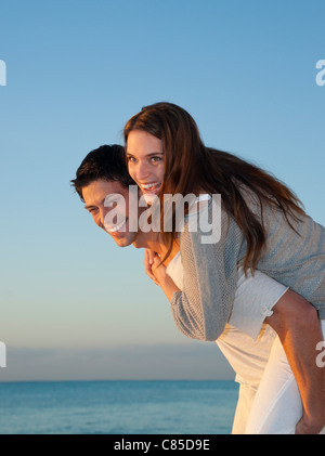 Couple by Ocean, Reef Playacar Resort and Spa, Playa del Carmen, Mexico Stock Photo