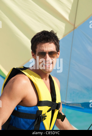 Man on Sailboat, Reef Playacar Resort and Spa, Playa del Carmen, Mexico Stock Photo