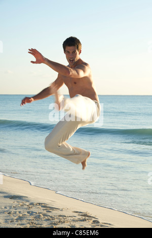 Man Practicing Martial Arts, Reef Playacar Resort and Spa Hotel, Playa del Carmen, Quintana Roo, Yucatan Peninsula, Mexico Stock Photo