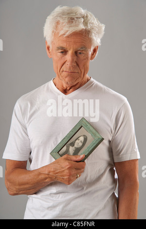 Man Holding Photograph Stock Photo