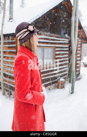 Woman in Red Coat, Frisco, Summit County, Colorado, USA Stock Photo