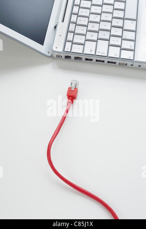 Ethernet Cable Disconnected from Laptop Computer Stock Photo