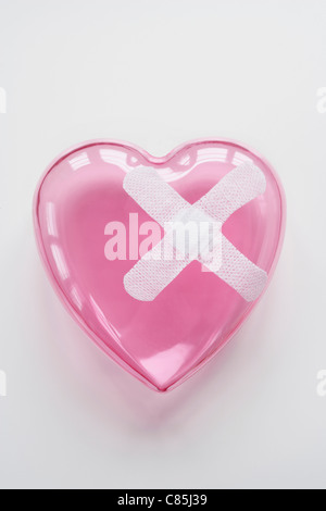 Pink Heart with Bandaids Stock Photo