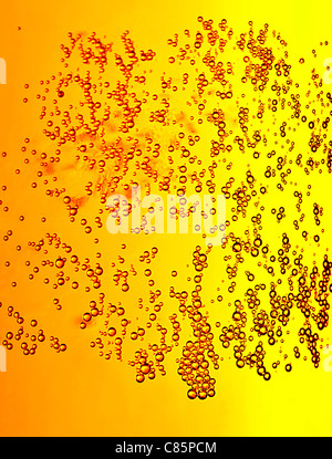 Abstract beer background, yellow cold drink with bubbles, texture and pattern of refreshing drink, macro Stock Photo