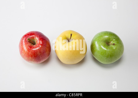 three different types of apples on white Stock Photo