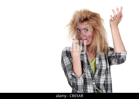 Woman receiving electric shock Stock Photo