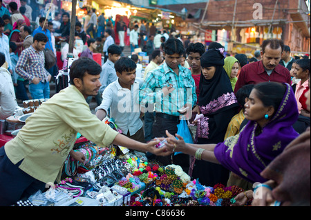 Muslim women shopping at Meena Bazar market in Muslim area of Old Delhi, India Stock Photo