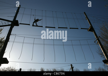 Aerial Extreme’s High Ropes Adventure Courses at Willen Lake in Milton Keynes, England, UK. Stock Photo