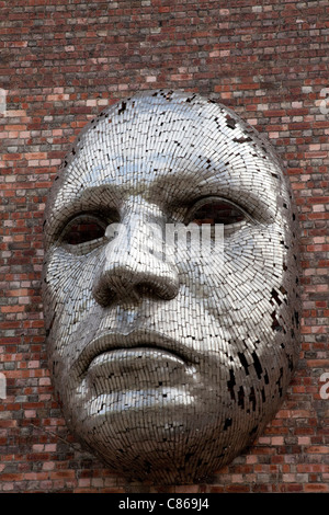 Metal face sculpture on outside wall of Lincoln City Drill Hall, by ...