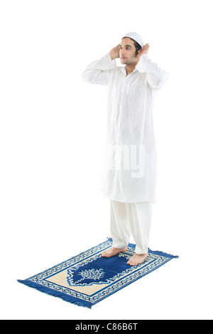 Muslim man praying Stock Photo