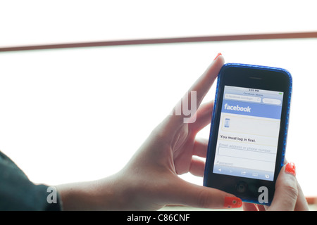 close up of smart phone with facebook on the page Stock Photo