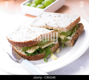 Cheese and Grape on seeded bread Stock Photo