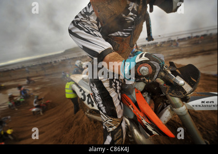 Dirt bikers compete in the Weston-Super-Mare beach race. Stock Photo