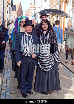 A man and his woman partner in Victorian Gothic dress at the Whitby Goth Week End spring 2011 Stock Photo