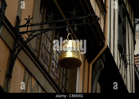 Cafe sign display over shop in old town of Rouen, France Stock Photo