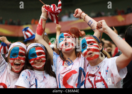 Young United States supporters cheer during a 2011 FIFA Women's World Cup semifinal soccer match against France. Stock Photo