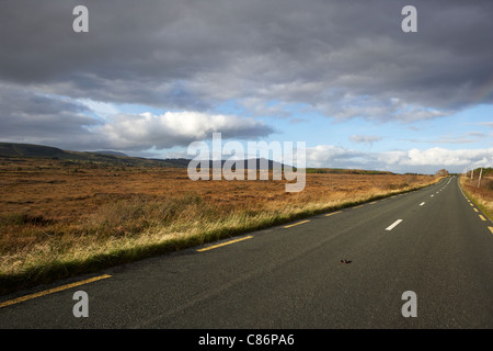 road through bogland and open rough ground in county mayo republic of ireland Stock Photo