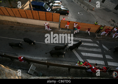 Running of the bulls Encierro at the San Fermin Festival in Pamplona, Navarre, Spain. Stock Photo