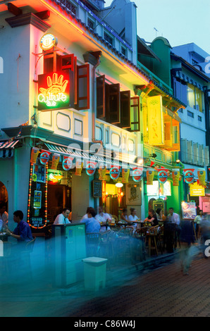 Quayside Seafood Restaurants on Singapore River with lamplights at night Stock Photo