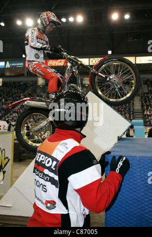 Shaun Morris from Great Britain with helper in action on his Gas Gas bike at the Belfast round of the Indoor Trial World Championship, won by Adam Raga from Spain.