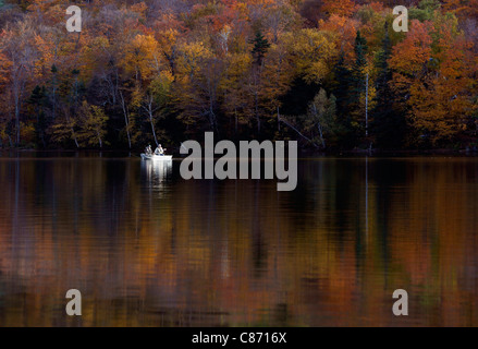 Fishing from a small boat on Echo Lake, Franconia Notch, White Mountain National Forest, New Hampshire Stock Photo