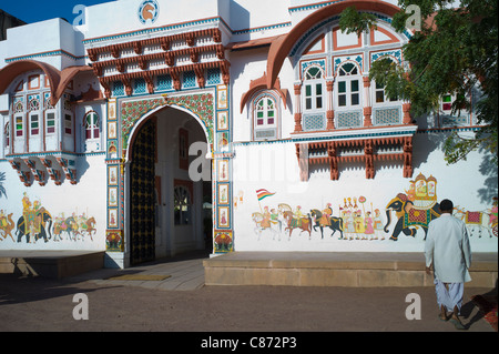 Rohet Garh fortress palace hotel with battlement walls with drawings of aristocratic ancestors Rohet, Rajasthan, Northern India Stock Photo