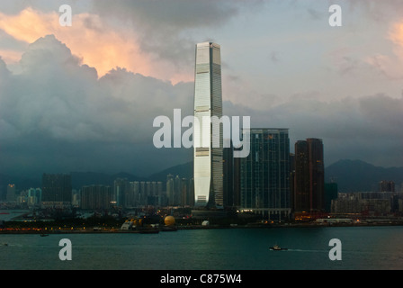 Kowloon with ICC building across Victoria Harbour, Hong Kong Stock Photo