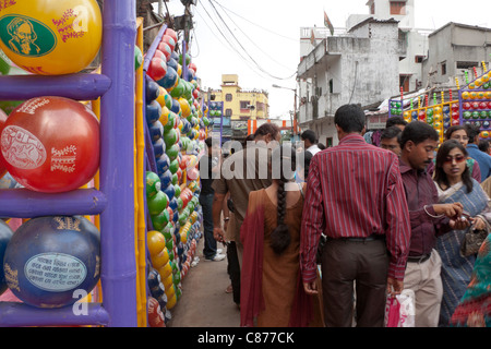 Devotees at 'Karbagan Durga Puja pandal' made of coloured plastic balls in 'Ultadanga', Kolkata (Calcutta), West Bengal, India. Stock Photo