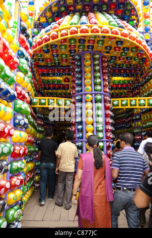 Devotees at 'Karbagan Durga Puja pandal' made of coloured plastic balls in 'Ultadanga', Kolkata (Calcutta), West Bengal, India. Stock Photo