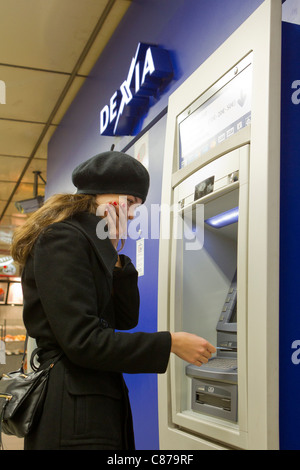 woman at atm Stock Photo