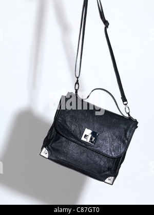 Black leather handbag on white background Stock Photo